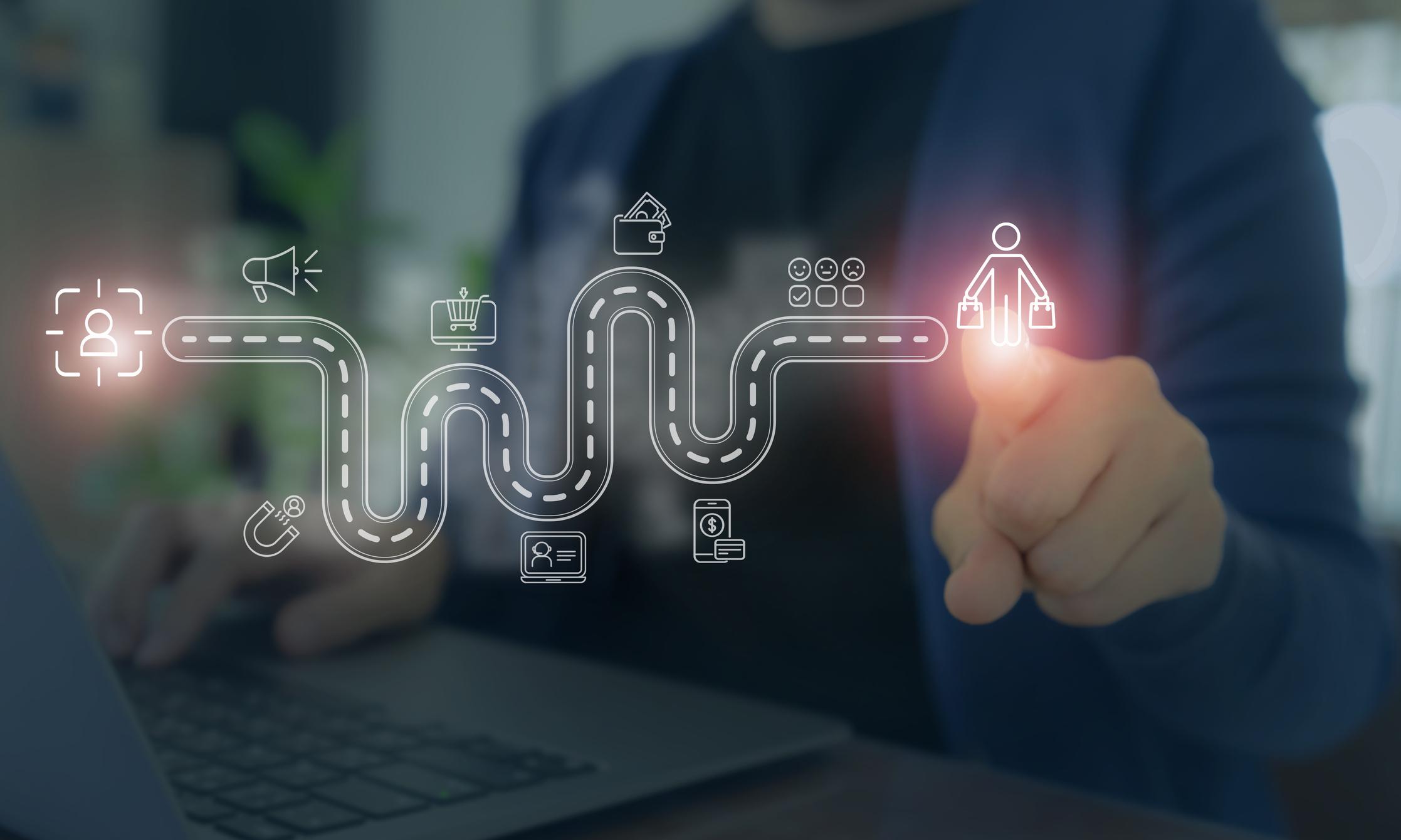 Customer journey map visualization concept. A business professional interacting with a digital customer journey map, illustrating key stages such as awareness, consumer behavior and decision making.